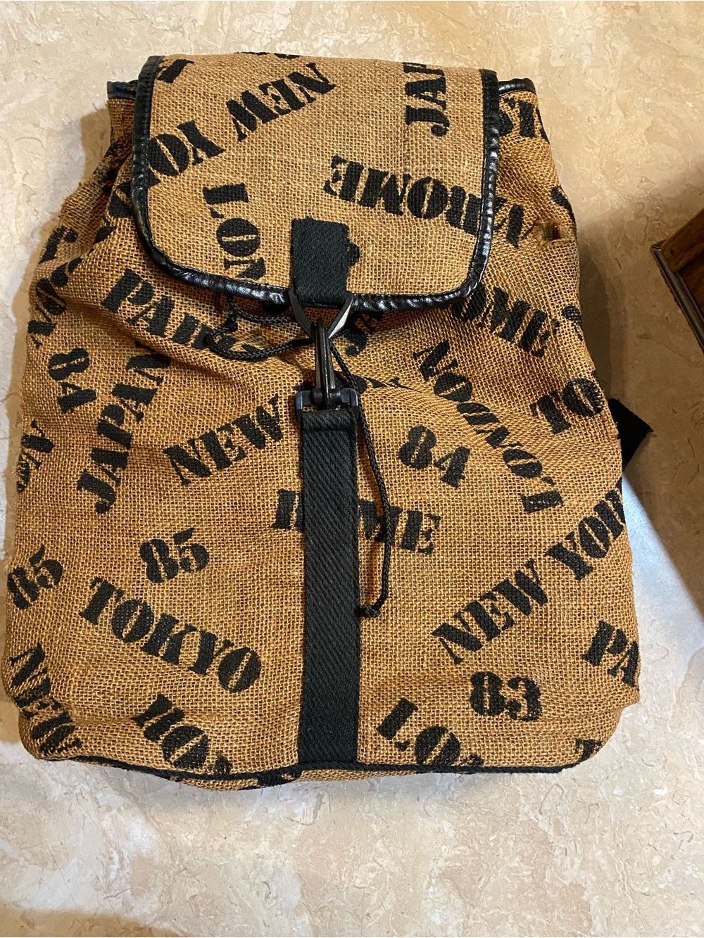Source Unknown Tan Canvas Backpack with Black Print Accents